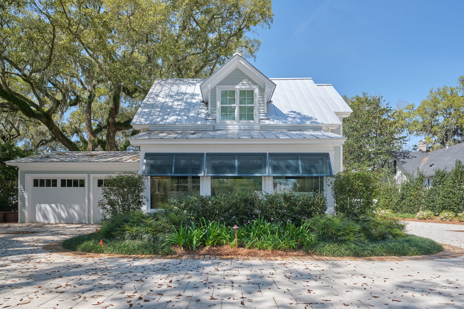 Bahama shutters shading windows on a Melbourne, FL home